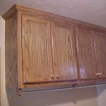 Oak Upper Utiltiy ROom Cabinets and Clothes Hanger