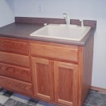 Utility Room Sink and Cabinets - Red Oak