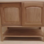 Nichols Red Oak Custom Raised Panel Vanity With Sliding Doors